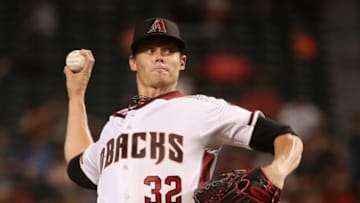 PHOENIX, AZ - AUGUST 22: Starting pitcher Clay Buchholz #32 of the Arizona Diamondbacks pitches against the Los Angeles Angels during the third inning of the MLB game at Chase Field on August 22, 2018 in Phoenix, Arizona. (Photo by Christian Petersen/Getty Images)