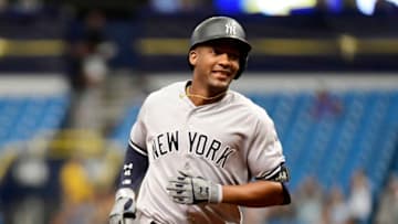 ST PETERSBURG, FL - SEPTEMBER 27: Miguel Andujar #41 of the New York Yankees hits a three-run homer in the first inning against the Tampa Bay Rays on September 27, 2018 at Tropicana Field in St Petersburg, Florida. (Photo by Julio Aguilar/Getty Images)