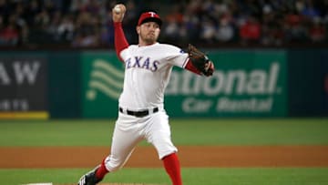 ARLINGTON, TX - APRIL 1: Adrian Sampson #52 of the Texas Rangers throws against the Houston Astros during the fifth inning at Globe Life Park in Arlington on April 1, 2019 in Arlington, Texas. (Photo by Ron Jenkins/Getty Images)