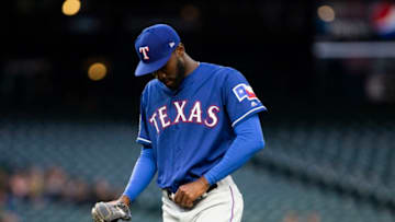 SEATTLE, WA - APRIL 25: Taylor Hearn #63 of the Texas Rangers adjusts his belt after giving up another run in the fifth inning against the Seattle Mariners at T-Mobile Park on April 25, 2019 in Seattle, Washington. (Photo by Lindsey Wasson/Getty Images)
