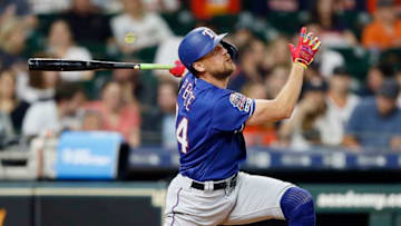 HOUSTON, TEXAS - MAY 09: Hunter Pence #24 of the Texas Rangers hits a two-run home run in the fourth inning against the Houston Astros at Minute Maid Park on May 09, 2019 in Houston, Texas. (Photo by Bob Levey/Getty Images)