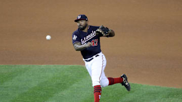 WASHINGTON, DC - OCTOBER 27: Howie Kendrick #47 of the Washington Nationals fields the ball and throws out Yuli Gurriel (not pictured) of the Houston Astros during the fourth inning in Game Five of the 2019 World Series at Nationals Park on October 27, 2019 in Washington, DC. (Photo by Will Newton/Getty Images)