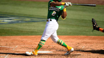 LOS ANGELES, CALIFORNIA - OCTOBER 06: Khris Davis #2 of the Oakland Athletics hits a single against the Houston Astros during the fourth inning in Game Two of the American League Division Series at Dodger Stadium on October 06, 2020 in Los Angeles, California. (Photo by Kevork Djansezian/Getty Images)