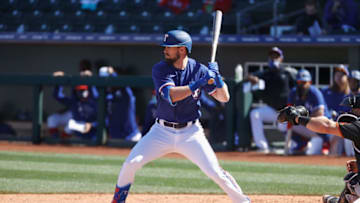 SURPRISE, ARIZONA - MARCH 01: David Dahl #21 of the Texas Rangers bats against the San Francisco Giants during the MLB spring training game on March 01, 2021 in Surprise, Arizona. (Photo by Christian Petersen/Getty Images)
