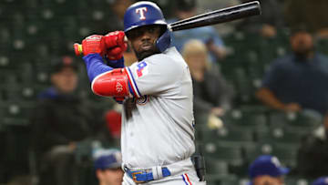 SEATTLE, WASHINGTON - MAY 27: Adolis Garcia #53 of the Texas Rangers reacts while at bat during the seventh inning against the Seattle Mariners at T-Mobile Park on May 27, 2021 in Seattle, Washington. (Photo by Abbie Parr/Getty Images)