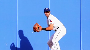 ARLINGTON, TX - JUNE 24: Joey Gallo #13 of the Texas Rangers fields the hit by Stephen Vogt #21 of the Oakland Athletics in the first inning at Globe Life Park in Arlington on June 24, 2015 in Arlington, Texas. (Photo by Ronald Martinez/Getty Images)
