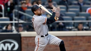 NEW YORK, NY - MAY 08: Hunter Pence #8 of the San Francisco Giants hits a two run home run in the first inning against the New York Mets on May 8, 2017 at Citi Field in the Flushing neighborhood of the Queens borough of New York City. (Photo by Elsa/Getty Images)