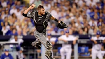 LOS ANGELES, CA - OCTOBER 06: Catcher Jeff Mathis #2 of the Arizona Diamondbacks throws the ball to second base in the third inning against the Los Angeles Dodgers in game one of the National League Division Series at Dodger Stadium on October 6, 2017 in Los Angeles, California. (Photo by Harry How/Getty Images)