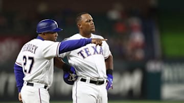 ARLINGTON, TX - APRIL 09: Adrian Beltre #29 of the Texas Rangers talks with third base coach, Tony Beasley in the fourth inning against the Los Angeles Angels at Globe Life Park in Arlington on April 9, 2018 in Arlington, Texas. (Photo by Ronald Martinez/Getty Images)