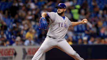 ST PETERSBURG, FL - APRIL 16: Martin Perez #33 of the Texas Rangers pitches during a game against the Tampa Bay Rays at Tropicana Field on April 16, 2018 in St Petersburg, Florida. (Photo by Mike Ehrmann/Getty Images)