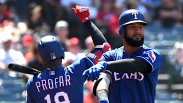 ANAHEIM, CA - JUNE 03: Nomar Mazara #30 is congratulated by Jurickson Profar #19 of the Texas Rangers after hitting a solo home run in the eighth inning of the game against the Los Angeles Angels of Anaheim at Angel Stadium on June 3, 2018 in Anaheim, California. (Photo by Jayne Kamin-Oncea/Getty Images)