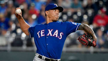 KANSAS CITY, MO - JUNE 19: Keone Kela #50 of the Texas Rangers throws in the ninth inning against the Kansas City Royals at Kauffman Stadium on June 19, 2018 in Kansas City, Missouri. (Photo by Ed Zurga/Getty Images)