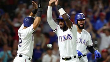 ARLINGTON, TX - JUNE 30: (L-R) Rougned Odor #12 of the Texas Rangers, Jurickson Profar #19 of the Texas Rangers, and Nomar Mazara #30 of the Texas Rangers celebrate after scoring on a double by Robinson Chirinos in the fourth inning of a baseball game against the Chicago White Sox at Globe Life Park in Arlington on June 30, 2018 in Arlington, Texas. (Photo by Richard Rodriguez/Getty Images)