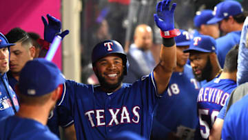 ANAHEIM, CA - AUGUST 28: Elvis Andrus #1 of the Texas Rangers is greeted in the dugout after scoring a run in the sixth inning against the Los Angeles Angels at Angel Stadium on August 28, 2019 in Anaheim, California. (Photo by Jayne Kamin-Oncea/Getty Images)