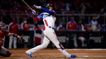 Dominican Republic's Ronald Guzman hits the ball during the Baseball Caribbean Series finals match between Puerto Rico and Dominican Republic at Teodoro Mariscal stadium, in Mazatlan, Mexico, on February 6, 2021. (Photo by CARLOS RAMIREZ / AFP) (Photo by CARLOS RAMIREZ/AFP via Getty Images)