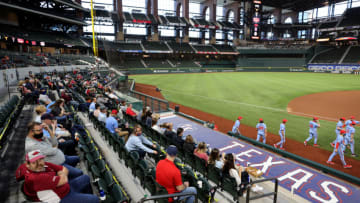 ARLINGTON, TEXAS - FEBRUARY 22: Fans attend a game between the Mississippi Rebels and the Texas Longhorns during the 2021 State Farm College Baseball Showdown at Globe Life Field on February 22, 2021 in Arlington, Texas. (Photo by Ronald Martinez/Getty Images)
