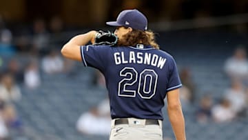 NEW YORK, NEW YORK - JUNE 01: Tyler Glasnow #20 of the Tampa Bay Rays prepares to deliver a pitch in the second inning against the New York Yankees at Yankee Stadium on June 01, 2021 in the Bronx borough of New York City. (Photo by Elsa/Getty Images)