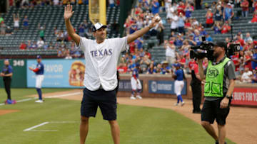 Jun 5, 2019; Arlington, TX, USA; Dallas Maverick former player Dirk Nowitzki waves to the crowd before throwing out a first pitch before a game between the Texas Rangers and the Baltimore Orioles at Globe Life Park in Arlington. Mandatory Credit: Tim Heitman-USA TODAY Sports