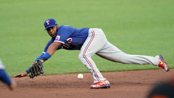 Aug 1, 2020; San Francisco, California, USA; Texas Rangers shortstop Elvis Andrus (1) makes a diving stop of a ground ball during the third inning against the San Francisco Giants at Oracle Park. Mandatory Credit: Darren Yamashita-USA TODAY Sports
