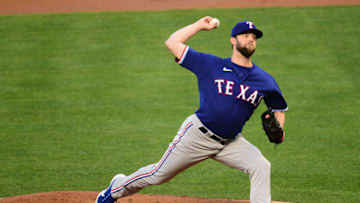 Apr 20, 2021; Anaheim, California, USA; Texas Rangers starting pitcher Jordan Lyles (24) throws against the Los Angeles Angels during the first inning at Angel Stadium. Mandatory Credit: Gary A. Vasquez-USA TODAY Sports