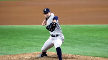 May 19, 2021; Arlington, Texas, USA; New York Yankees starting pitcher Corey Kluber (28) throws during the game against the Texas Rangers at Globe Life Field. Mandatory Credit: Kevin Jairaj-USA TODAY Sports