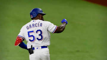May 22, 2021; Arlington, Texas, USA; Texas Rangers right fielder Adolis Garcia (53) celebrates hitting a home run against the Houston Astros during the fifth inning at Globe Life Field. Mandatory Credit: Jerome Miron-USA TODAY Sports