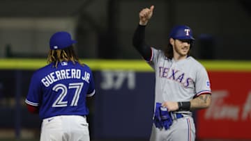Jul 16, 2021; Buffalo, New York, USA; Texas Rangers catcher Jonah Heim (28) reacts to the crowd during the seventh inning against Toronto Blue Jays at Sahlen Field. Mandatory Credit: Timothy T. Ludwig-USA TODAY Sports