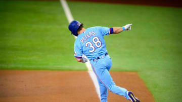Aug 15, 2021; Arlington, Texas, USA; Texas Rangers center fielder DJ Peters (38) rounds the bases after he hits a two run home run against the Oakland Athletics during the first inning at Globe Life Field. Mandatory Credit: Jerome Miron-USA TODAY Sports