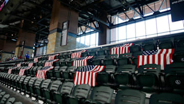 Aug 31, 2021; Arlington, Texas, USA; Thirteen flags draped over seats in the outfield before the game between the Texas Rangers and the Colorado Rockies at Globe Life Field. Mandatory Credit: Tim Heitman-USA TODAY Sports
