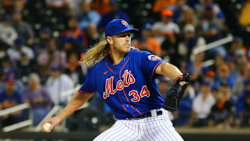 Sep 28, 2021; New York City, New York, USA; New York Mets starting pitcher Noah Syndergaard (34) throws against the Miami Marlins during the first inning of game two of a doubleheader at Citi Field. Mandatory Credit: Andy Marlin-USA TODAY Sports