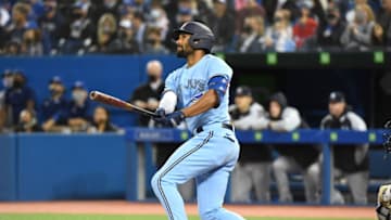 Sep 29, 2021; Toronto, Ontario, CAN; Toronto Blue Jays second baseman Marcus Semien (10) hits a two-run home run against New York Yankees in the first inning at Rogers Centre. Mandatory Credit: Dan Hamilton-USA TODAY Sports