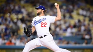 Oct 1, 2021; Los Angeles, California, USA; Los Angeles Dodgers starting pitcher Clayton Kershaw (22) throws against the Milwaukee Brewers during the first inning at Dodger Stadium. Mandatory Credit: Gary A. Vasquez-USA TODAY Sports
