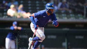 Mar 8, 2021; Mesa, Arizona, USA; Texas Rangers designated hitter Willie Calhoun bats against the Chicago Cubs during the first inning of a spring training game at Sloan Park. Mandatory Credit: Joe Camporeale-USA TODAY Sports
