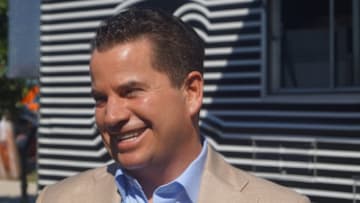 Matt Higgins, Vice Chairman of the Miami Dolphins speaks outside HRS about &pizza and Shark Tank - image by Brian Miller