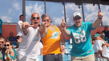 Members of the Newfoundland Dolphins fan group ShedDawgs cheer on the Dolphins.