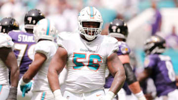 MIAMI, FLORIDA - SEPTEMBER 08: Davon Godchaux #56 of the Miami Dolphins reacts against the Baltimore Ravens during the second quarter at Hard Rock Stadium on September 08, 2019 in Miami, Florida. (Photo by Michael Reaves/Getty Images)