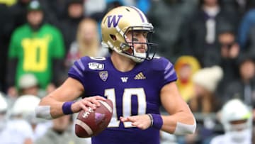 SEATTLE, WASHINGTON - OCTOBER 19: Jacob Eason #10 of the Washington Huskies throws the ball against the Oregon Ducks in the first quarter during their game at Husky Stadium on October 19, 2019 in Seattle, Washington. (Photo by Abbie Parr/Getty Images)