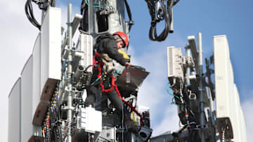 OREM, UT - NOVEMBER 26: A worker rebuilds a cellular tower with 5G equipment for the Verizon network on November 26, 2019 in Orem, Utah. The new 5G networks that are coming soon, will be 10x faster than the old 4G networks. (Photo by George Frey/Getty Images)