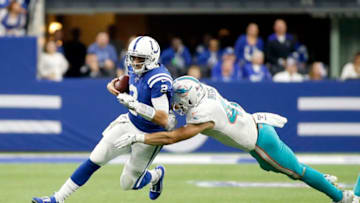 INDIANAPOLIS, INDIANA - NOVEMBER 10: Brian Hoyer #2 of the Indianapolis Colts runs the ball and is tackled by Vince Biegel #47 of the Miami Dolphins during the second quarter at Lucas Oil Stadium on November 10, 2019 in Indianapolis, Indiana. (Photo by Justin Casterline/Getty Images)