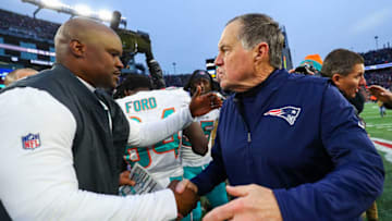FOXBOROUGH, MA - DECEMBER 29: Head coach Brian Flores of the Miami Dolphins shakes hands with head coach Bill Belichick of the New England Patriots after a Dolphins victory at Gillette Stadium on December 29, 2019 in Foxborough, Massachusetts. (Photo by Adam Glanzman/Getty Images)