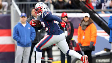 FOXBOROUGH, MASSACHUSETTS - DECEMBER 29: Elandon Roberts #52 of the New England Patriots runs the ball for a touchdown against the Miami Dolphins at Gillette Stadium on December 29, 2019 in Foxborough, Massachusetts. (Photo by Maddie Meyer/Getty Images)