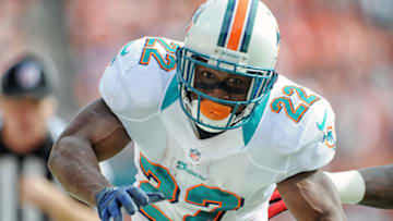 MIAMI GARDENS, FL - DECEMBER 23: Running back Reggie Bush #22 of the Miami Dolphins carries the ball during a NFL game against the Buffalo Bills on December 23, 2012 at Sun Life Stadium in Miami Gardens, Florida. (Photo by Ronald C. Modra/Getty Images)