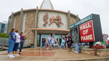 CANTON, OH - AUGUST 2: Fans take a photo outside the Hall of Fame prior to the NFL Class of 2014 Pro Football Hall of Fame Enshrinement Ceremony at Fawcett Stadium on August 2, 2014 in Canton, Ohio. (Photo by Jason Miller/Getty Images)
