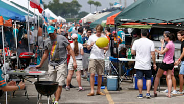MIAMI GARDENS, FL - SEPTEMBER 07: Football fans tailgate in the parking lot before the Miami Dolphins met the New England Patriots in a game at Sun Life Stadium on September 7, 2014 in Miami Gardens, Florida. (Photo by Rob Foldy/Getty Images)