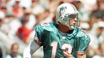 SAN FRANCISCO, UNITED STATES: Miami Dolphins quarterback Dan Marino drops back to pass during first quarter action against the San Francisco 49ers 23 August in San Francisco, CA. AFP PHOTOS/Monica M. DAVEY (Photo credit should read MONICA M. DAVEY/AFP via Getty Images)