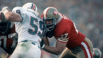 STANFORD, CA - JANUARY 20: Offensive lineman Billy Shields #67 of the San Francisco 49ers blocks linebacker Bob Brudzinski #59 of the Miami Dolphins during Super Bowl XIX at Stanford Stadium on January 20, 1985 in Stanford, California. The 49ers defeated the Dolphins 38-16. (Photo by George Gojkovich/Getty Images)