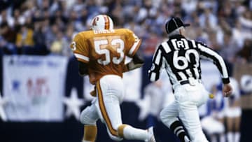 Tampa Bay Buccaneers linebacker Hugh Green's (53) runs with Cowboys quarterback Danny White's fumble for a 60-yard touchdown return during the Buccaneers 30-17 loss to the Dallas Cowboys in the 1982 NFC First-Round Playoff Game in January 9, 1983 at Texas Stadium in Irving, Texas. (Photo by Sylvia Allen/Getty Images) *** Local Caption ***