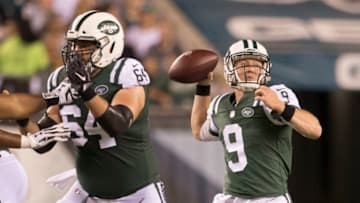 PHILADELPHIA, PA - AUGUST 30: John Wolford #9 of the New York Jets passes the ball while Travis Swanson #64 blocks in the second quarter during the preseason game against the Philadelphia Eagles at Lincoln Financial Field on August 30, 2018 in Philadelphia, Pennsylvania. The Eagles defeated the Jets 10-9. (Photo by Mitchell Leff/Getty Images)