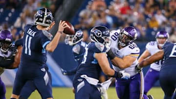 NASHVILLE, TN - AUGUST 30: David Parry #60 of the Minnesota Vikings rushes quarterback Luke Falk #11 of the Tennessee Titans during the second half of a pre-season game at Nissan Stadium on August 30, 2018 in Nashville, Tennessee. (Photo by Frederick Breedon/Getty Images)