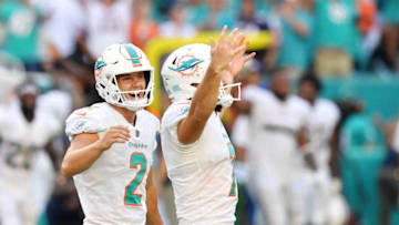 MIAMI, FL - OCTOBER 14: Jason Sanders #7 of the Miami Dolphins celebrates with Matt Haack #2 after kicking the game winning field goal against the Chicago Bears in overtime at Hard Rock Stadium on October 14, 2018 in Miami, Florida. (Photo by Mark Brown/Getty Images)